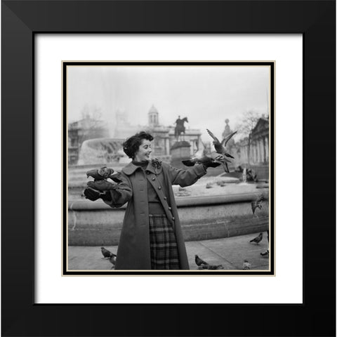 Elizabeth Taylor with pigeons Black Modern Wood Framed Art Print with Double Matting by Hollywood Photo Archive