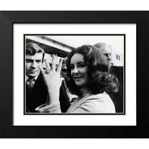 Elizabeth Taylor and her Diamond Ring Black Modern Wood Framed Art Print with Double Matting by Hollywood Photo Archive