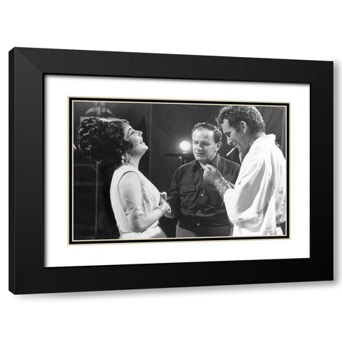Cleopatra - Elizabeth Taylor on set with Richard Burton and Joseph Mankiewicz Black Modern Wood Framed Art Print with Double Matting by Hollywood Photo Archive
