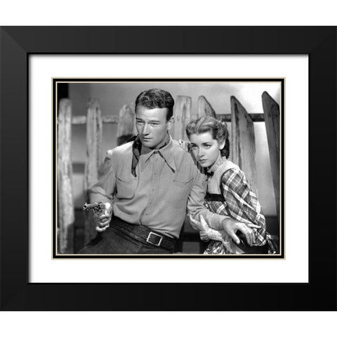 John Wayne Black Modern Wood Framed Art Print with Double Matting by Hollywood Photo Archive
