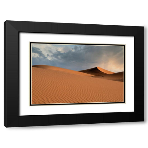Sand dunes glow orange at sunset in the Sahara Desert. Black Modern Wood Framed Art Print with Double Matting by Sederquist, Betty
