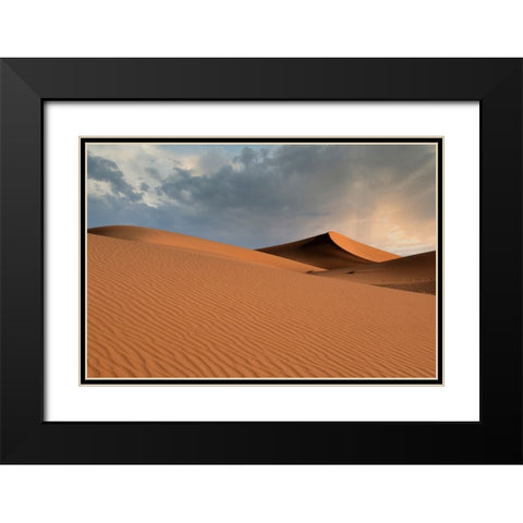 Sand dunes glow orange at sunset in the Sahara Desert. Black Modern Wood Framed Art Print with Double Matting by Sederquist, Betty