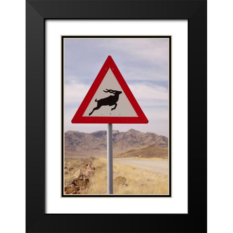 Namibia, Namib Desert, Kudu crossing caution sign Black Modern Wood Framed Art Print with Double Matting by Kaveney, Wendy