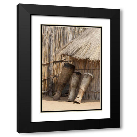 Namibia, Caprivi Strip Tribal drums lean on hut Black Modern Wood Framed Art Print with Double Matting by Kaveney, Wendy