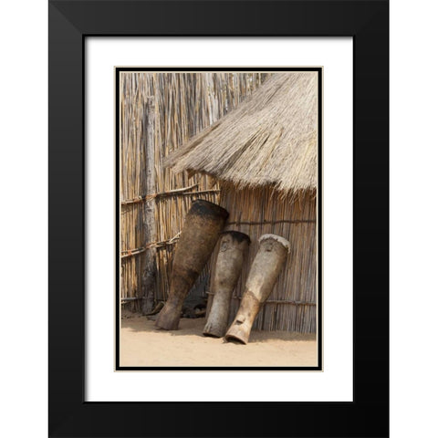 Namibia, Caprivi Strip Tribal drums lean on hut Black Modern Wood Framed Art Print with Double Matting by Kaveney, Wendy
