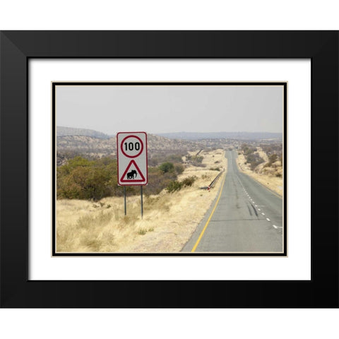 Namibia, Etosha NP Speed limit and caution sign Black Modern Wood Framed Art Print with Double Matting by Kaveney, Wendy