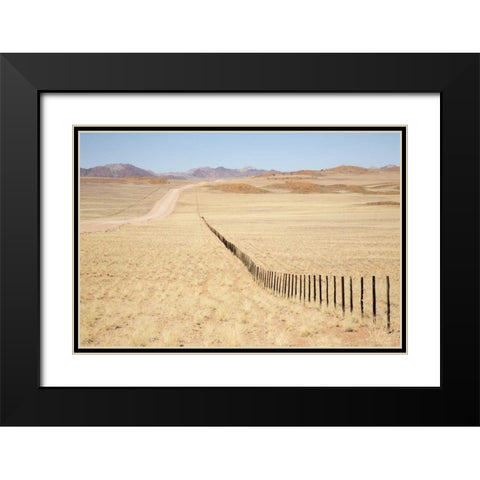 Namibia, Namib Desert Road and fence in desert Black Modern Wood Framed Art Print with Double Matting by Kaveney, Wendy