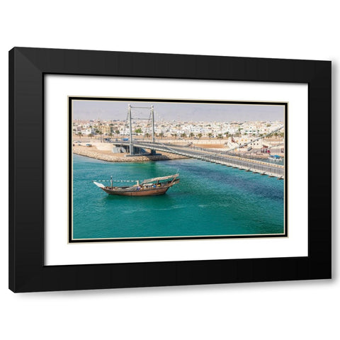 Middle East-Arabian Peninsula-Oman-Al Batinah South-Dhow passing under a suspension bridge Black Modern Wood Framed Art Print with Double Matting by Wilson, Emily M.