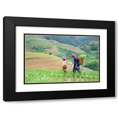 Vietnam-Grandma taking care of granddaughter-Farming community with traditional Sapa dresses Black Modern Wood Framed Art Print with Double Matting by Norring, Tom