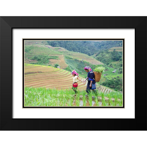 Vietnam-Grandma taking care of granddaughter-Farming community with traditional Sapa dresses Black Modern Wood Framed Art Print with Double Matting by Norring, Tom
