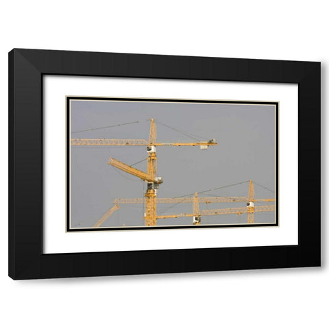 UAE, Dubai, Marina Yellow construction cranes Black Modern Wood Framed Art Print with Double Matting by Young, Bill