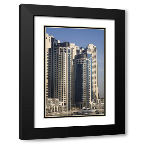 UAE, Dubai Marina towers with boats at anchor Black Modern Wood Framed Art Print with Double Matting by Young, Bill