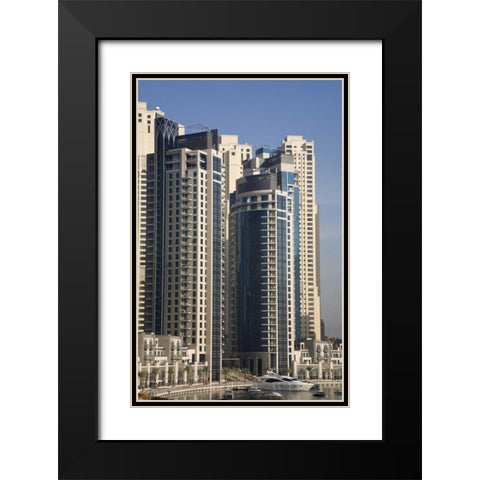 UAE, Dubai Marina towers with boats at anchor Black Modern Wood Framed Art Print with Double Matting by Young, Bill