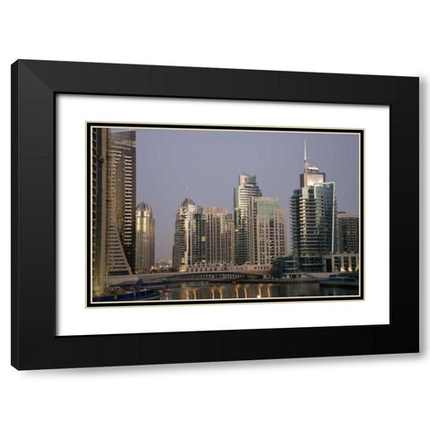 UAE, Dubai Tower lights reflect on marina water Black Modern Wood Framed Art Print with Double Matting by Young, Bill