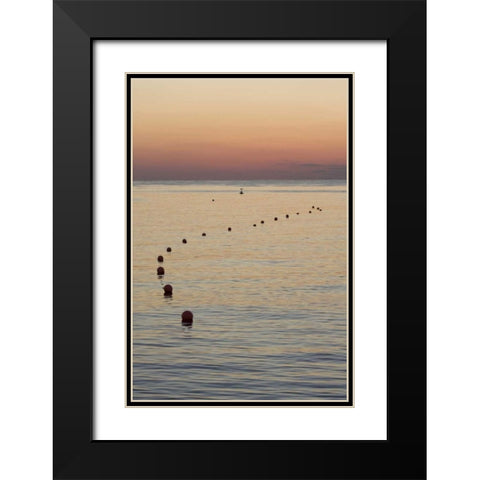 UAE, Fujairah Sunrise over marker buoys on beach Black Modern Wood Framed Art Print with Double Matting by Young, Bill