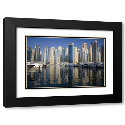 UAE, Dubai Marina towers with boats at anchor Black Modern Wood Framed Art Print with Double Matting by Young, Bill