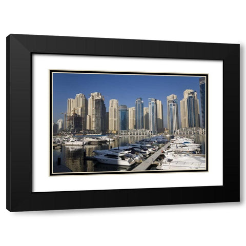 UAE, Dubai Marina towers with boats at anchor Black Modern Wood Framed Art Print with Double Matting by Young, Bill