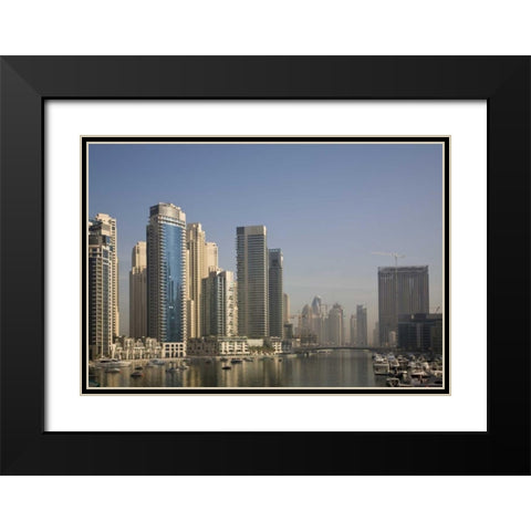 UAE, Dubai Marina towers with boats at anchor Black Modern Wood Framed Art Print with Double Matting by Young, Bill