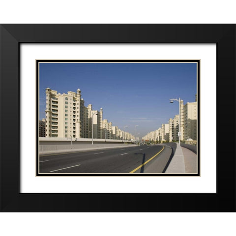 UAE, Dubai Road into the Palm Jumeirah Black Modern Wood Framed Art Print with Double Matting by Young, Bill