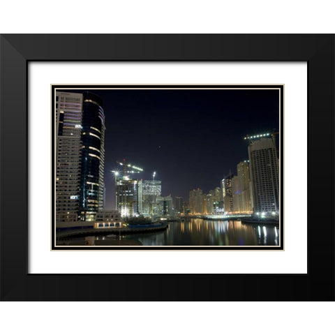 UAE, Dubai Towers on marina at night Black Modern Wood Framed Art Print with Double Matting by Young, Bill