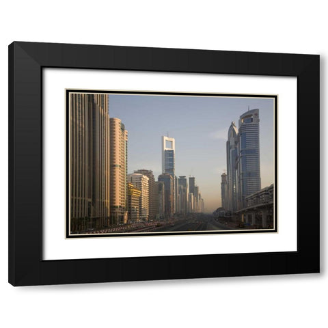UAE, Dubai Towers along Sheik Zayed Road Black Modern Wood Framed Art Print with Double Matting by Young, Bill
