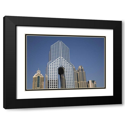 UAE, Dubai Modern Architecture in downtown Black Modern Wood Framed Art Print with Double Matting by Young, Bill