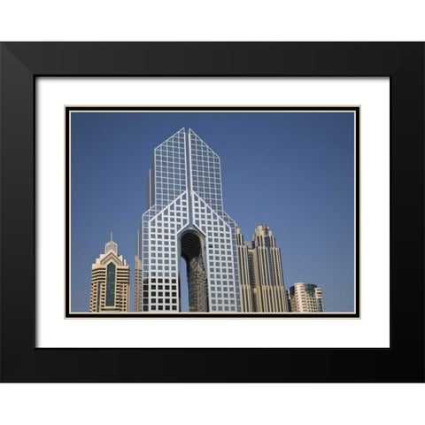 UAE, Dubai Modern Architecture in downtown Black Modern Wood Framed Art Print with Double Matting by Young, Bill