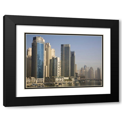 UAE, Dubai Marina towers with boats at anchor Black Modern Wood Framed Art Print with Double Matting by Young, Bill