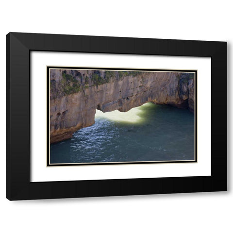 New Zealand, South Island Sunlight on sea arch Black Modern Wood Framed Art Print with Double Matting by Grall, Don