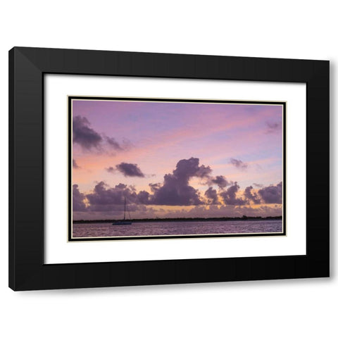 Bahamas, Exuma Is Sailboat anchored at sunset Black Modern Wood Framed Art Print with Double Matting by Paulson, Don