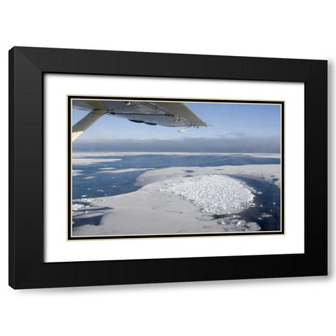 Canada, Manitoba, Aerial view of ice on the bay Black Modern Wood Framed Art Print with Double Matting by Kaveney, Wendy
