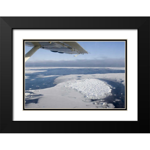Canada, Manitoba, Aerial view of ice on the bay Black Modern Wood Framed Art Print with Double Matting by Kaveney, Wendy