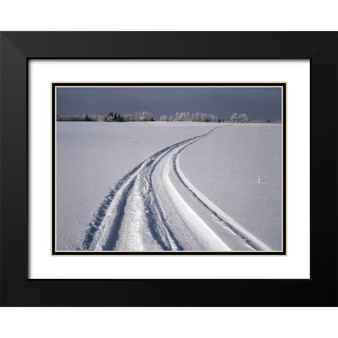 Canada, Manitoba, Tire tracks in snow landscape Black Modern Wood Framed Art Print with Double Matting by Grandmaison, Mike
