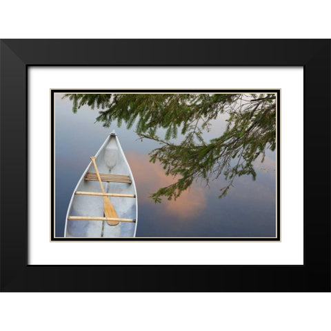 Canada, Quebec, Eastman Canoe on lake at sunset Black Modern Wood Framed Art Print with Double Matting by Delisle, Gilles