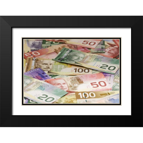 Close-up of assorted Canadian paper currency Black Modern Wood Framed Art Print with Double Matting by Flaherty, Dennis