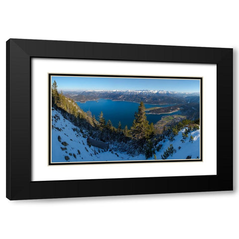 The view from Mt-Fahrenberg-Kopf towards lake Walchensee and Karwendel mountain range during winter Black Modern Wood Framed Art Print with Double Matting by Zwick, Martin