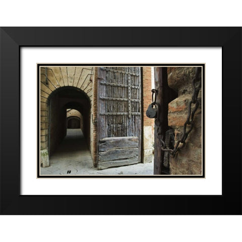 Italy, Tuscany, Fortified gate and an alley Black Modern Wood Framed Art Print with Double Matting by Flaherty, Dennis