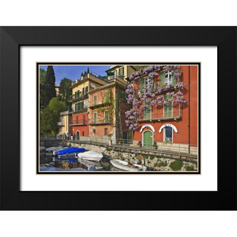Italy, Varenna Boats moored in village harbor Black Modern Wood Framed Art Print with Double Matting by Flaherty, Dennis