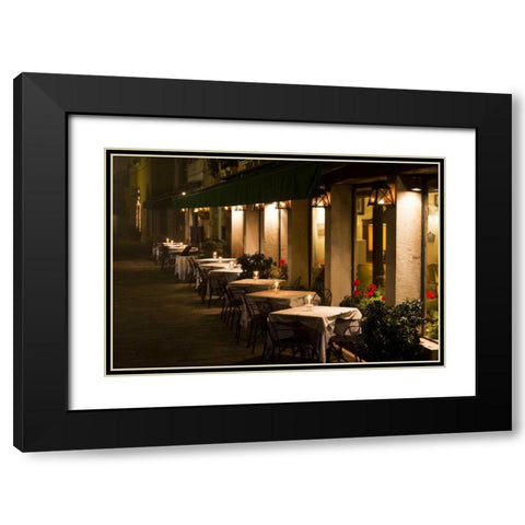 Italy, Venice Restaurant tables lit at night Black Modern Wood Framed Art Print with Double Matting by Young, Bill