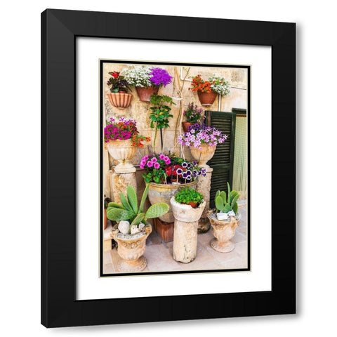 Italy-Apulia-Metropolitan City of Bari-Monopoli Flowers in planters outside a stone building Black Modern Wood Framed Art Print with Double Matting by Wilson, Emily