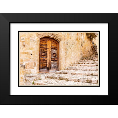 Italy-Basilicata-Province of Matera-Matera Old wooden door in a stone wall above stone steps Black Modern Wood Framed Art Print with Double Matting by Wilson, Emily