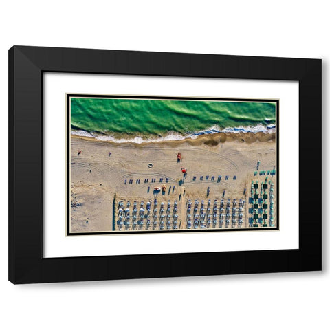 Italy-Tuscany-Torre del Lago Puccini-boathouse and neatly ordered beach chairs and umbrellas Black Modern Wood Framed Art Print with Double Matting by Molinari, Michele