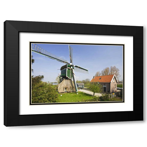 Netherlands, Leiderdorp Traditional windmill Black Modern Wood Framed Art Print with Double Matting by Flaherty, Dennis