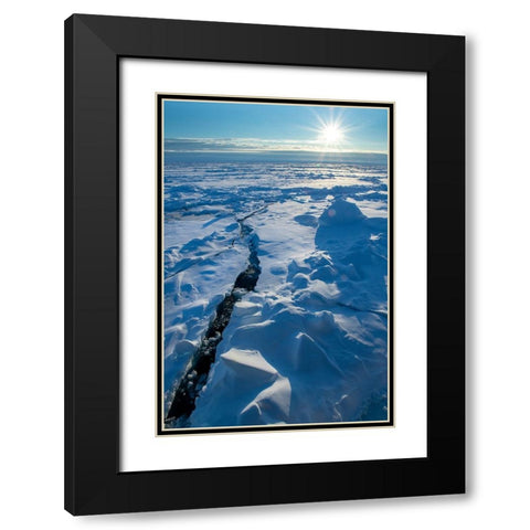 Norway Icescape at 84 degrees north-crack in ice with sunburst Black Modern Wood Framed Art Print with Double Matting by Hopkins, Cindy Miller
