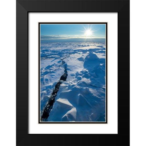 Norway Icescape at 84 degrees north-crack in ice with sunburst Black Modern Wood Framed Art Print with Double Matting by Hopkins, Cindy Miller