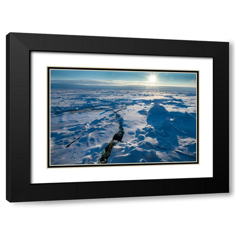 Norway Icescape at 84 degrees north-crack in ice with sunburst Black Modern Wood Framed Art Print with Double Matting by Hopkins, Cindy Miller