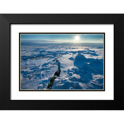 Norway Icescape at 84 degrees north-crack in ice with sunburst Black Modern Wood Framed Art Print with Double Matting by Hopkins, Cindy Miller