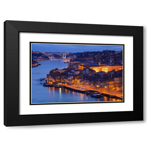 Portugal, Porto Overview of city at night Black Modern Wood Framed Art Print with Double Matting by Zuckerman, Jim