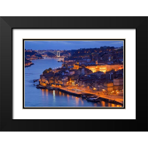 Portugal, Porto View of city and harbor at night Black Modern Wood Framed Art Print with Double Matting by Zuckerman, Jim