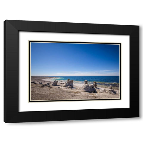 Sweden-Faro Island-Langhammars Area-Langhammar coastal limestone rauk rocks with visitors Black Modern Wood Framed Art Print with Double Matting by Bibikow, Walter